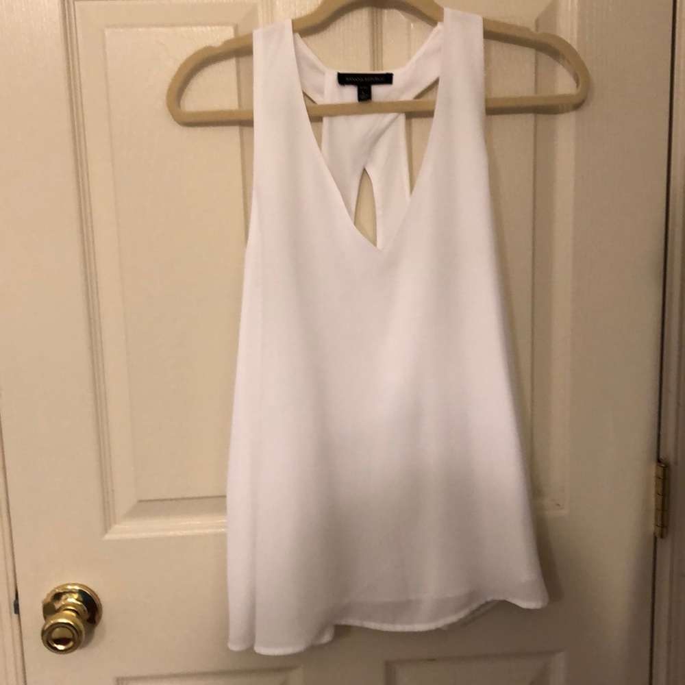 White sleeveless top